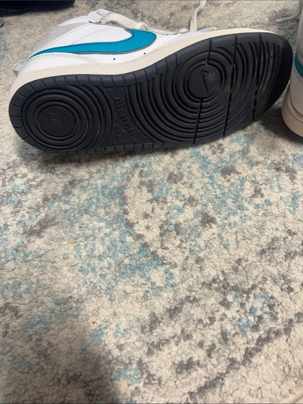 Nike White High-Top Sneakers with Teal Swoosh